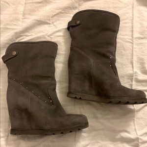 These are womens wedge heel size 6 Uggs with pink rhinestones.